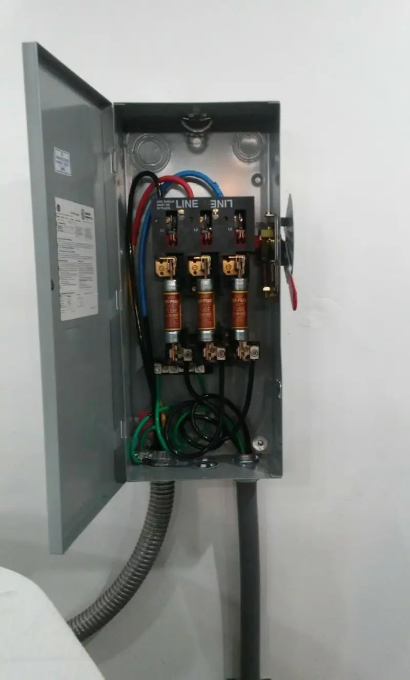 Three-phase disconnect switch installed for Smoke Detector Installation in Ecorse
